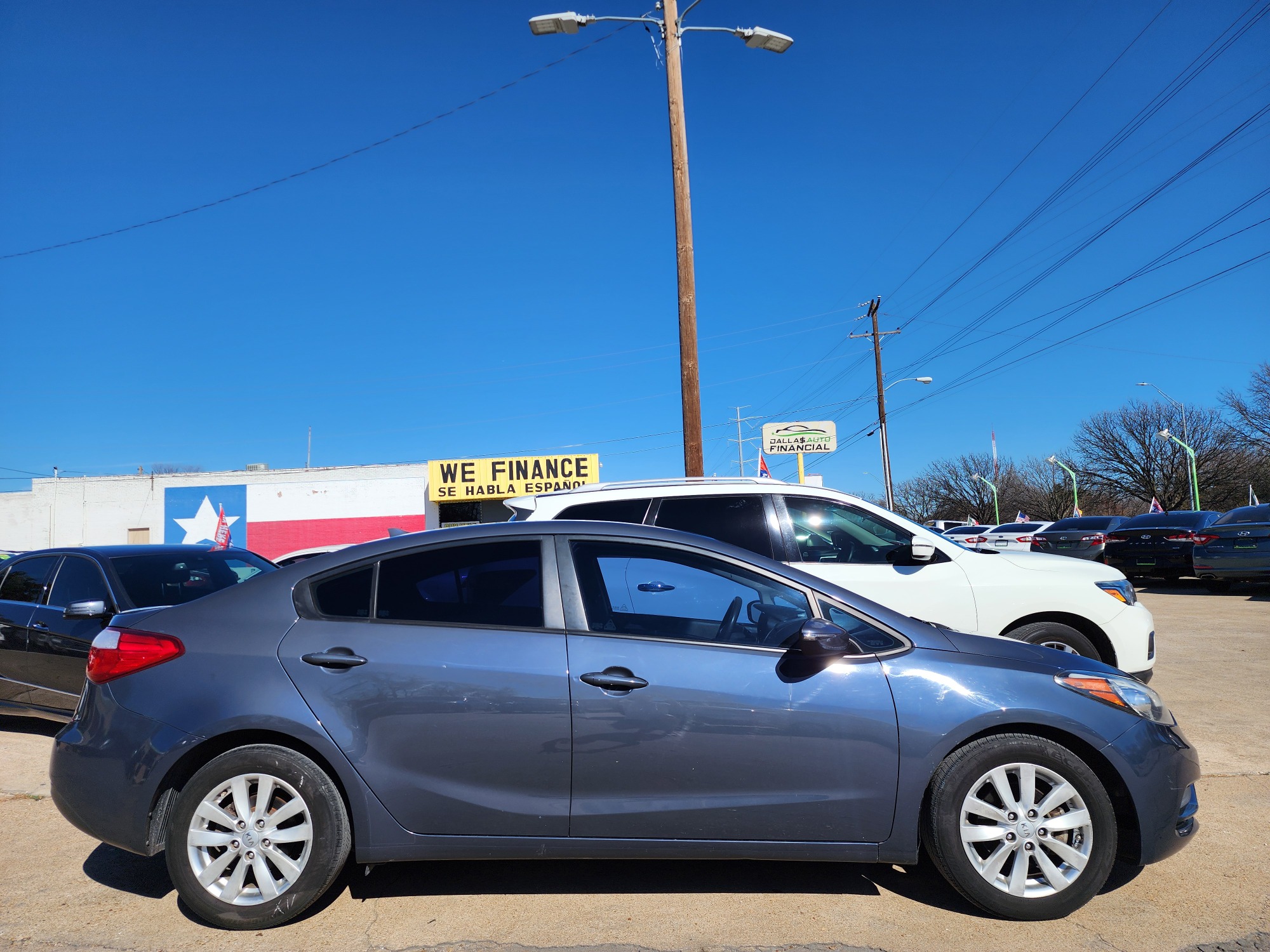 2016 BLUE Kia Forte LX (KNAFX4A65G5) with an 1.8L L4 DOHC 16V engine, 6-Speed Automatic transmission, located at 2660 S.Garland Avenue	, Garland, TX, 75041, (469) 298-3118, 32.885387, -96.656776 - Photo #2